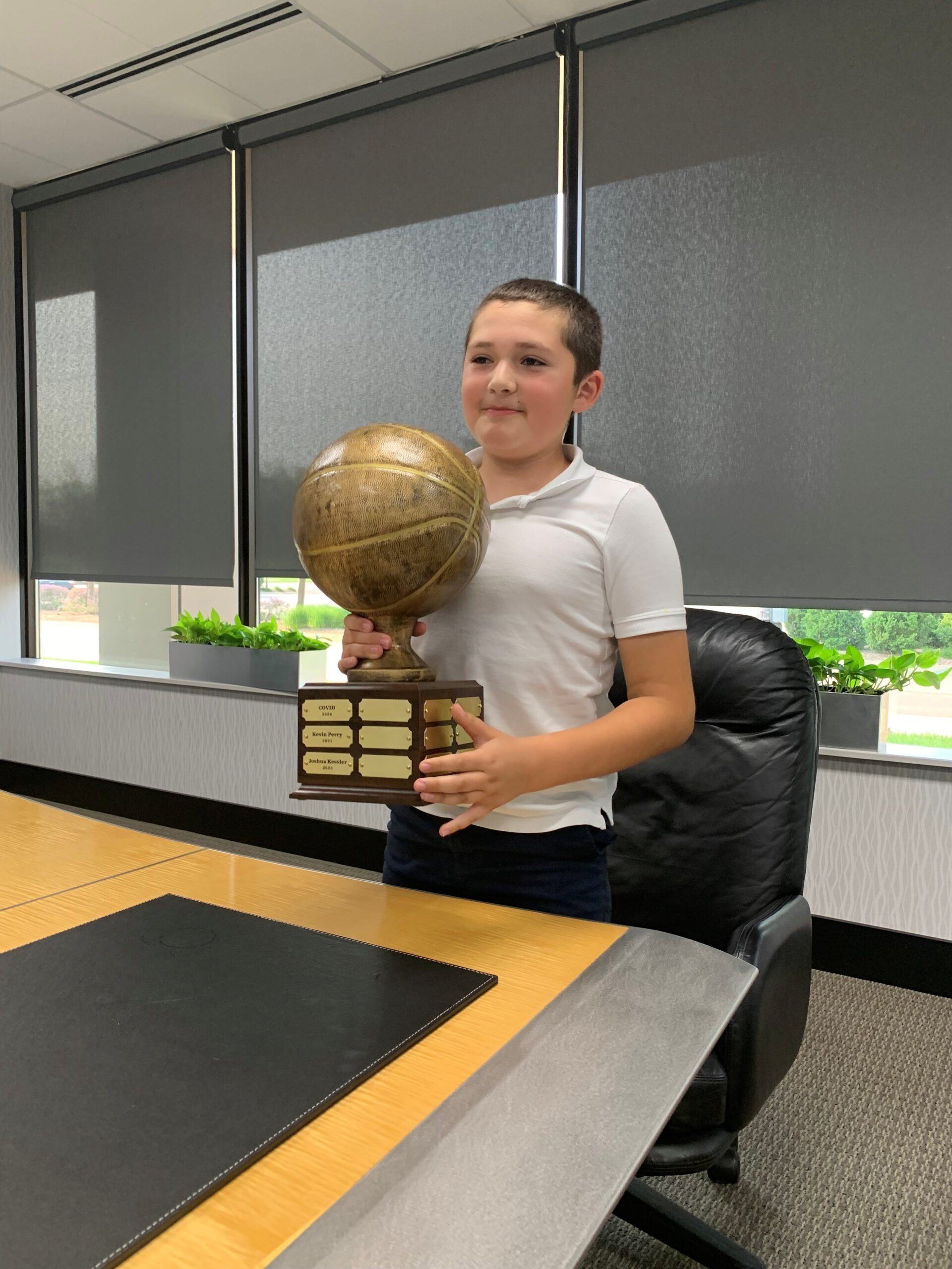 Joshua Kessler holding basketball.