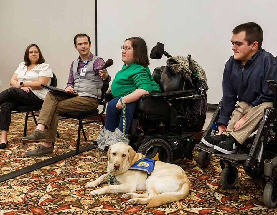 woman speaker with dog