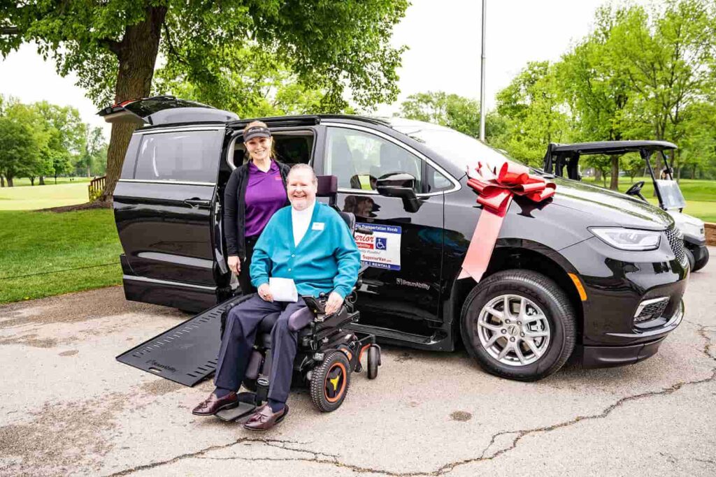 Superior van with 2 people posing